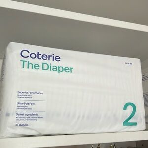 Two packages of unopened Coterie diapers